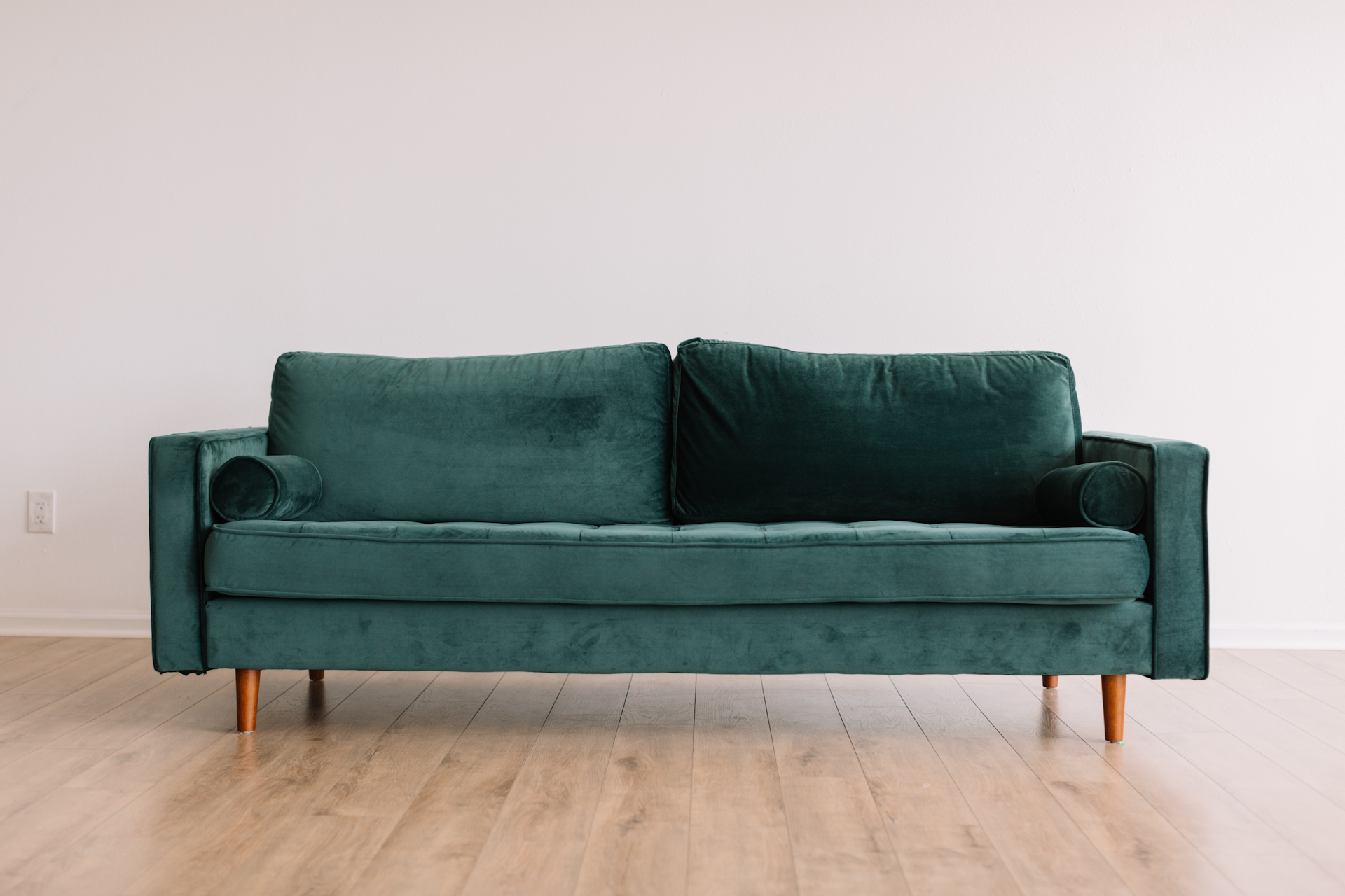 Velvet sofa in a bright living room